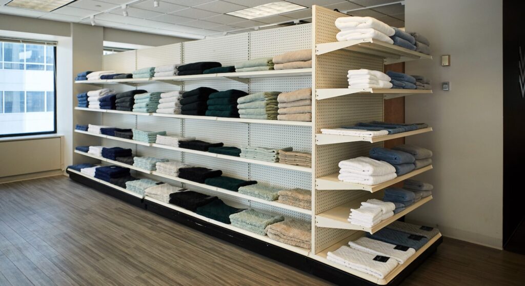 Showroom of towels on shelves